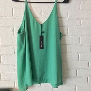 V-neck cut spaghetti strap style blouse